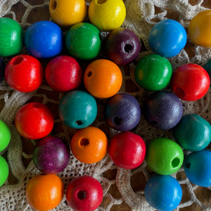 Rainbow wooden beads to make a necklace